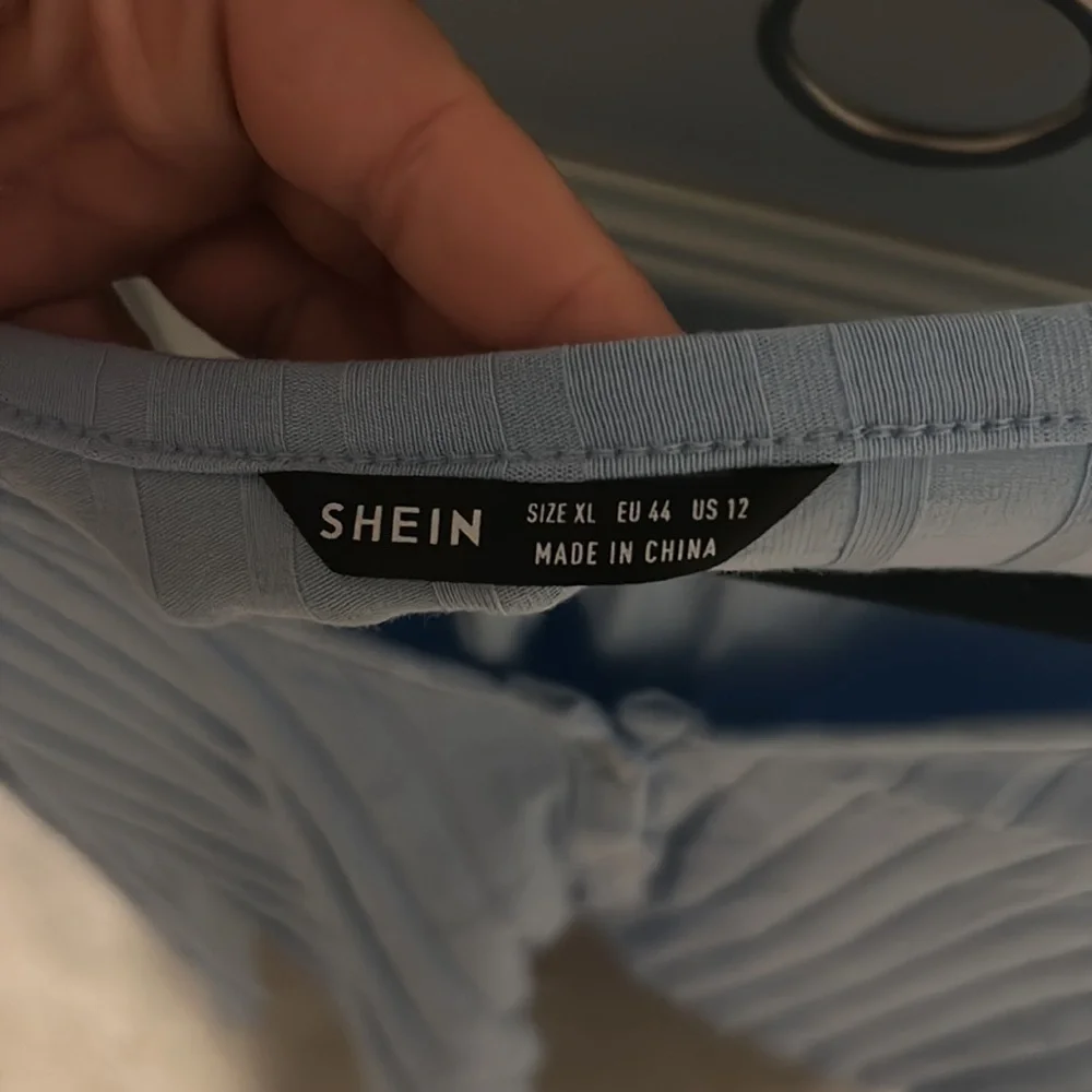 Blue V-Neck Button-Up Ribbed Top - Picture 3 of 3